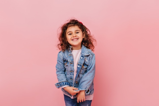 Sweet kid with pink background